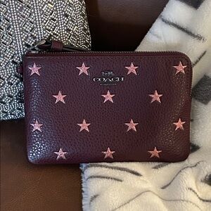 COACH | Dark Wine Colored Corner Zip Wristlet with Pink Shiny Star Details